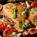 Морський окунь з помідорами та часником